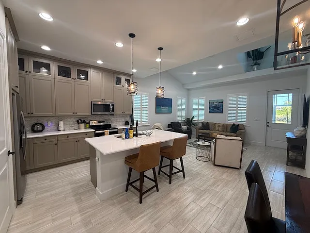 Entire kitchen is upgraded with soft close cabinets quartz counter tops etc.