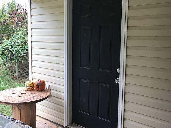 Utility room in carport