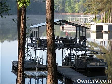 Private 2-story 2/3 covered dock with power, water, plus more!