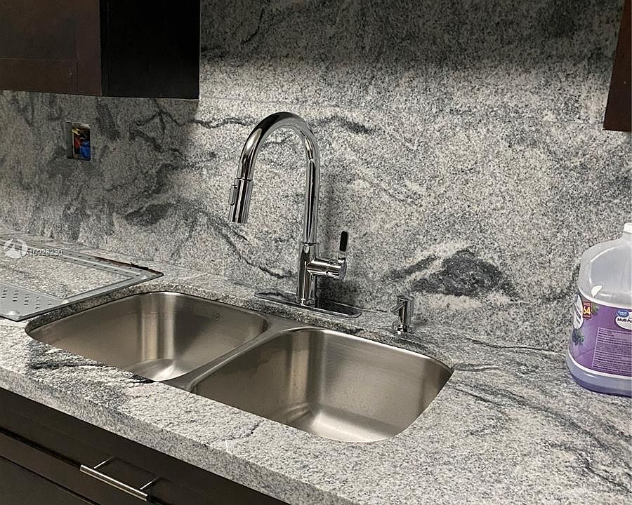 2nd image of 7661 Raleigh St #0