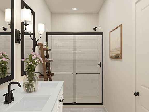 Primary bath with glass shower enclosure