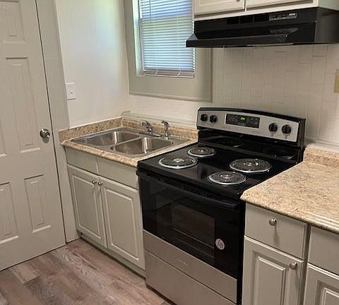 The kitchen and the pantry door