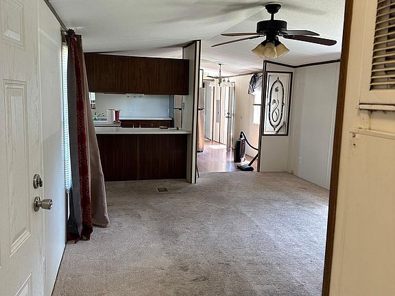 View from the 2nd bedroom area, looking into the living room and Kitchen