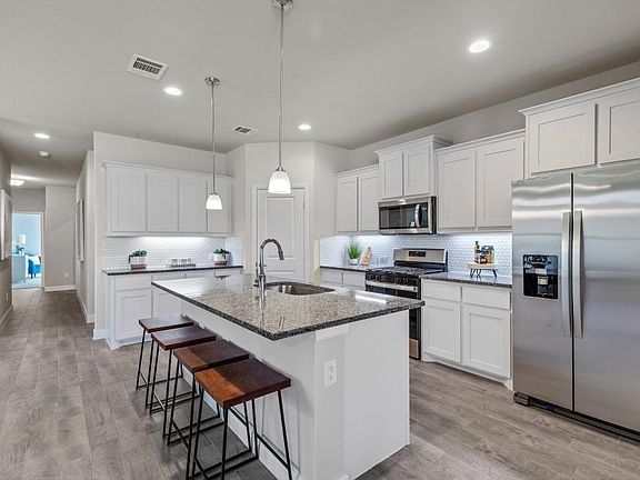 All photos shown here may not depict the specified home & features included are for illustration purposes only.