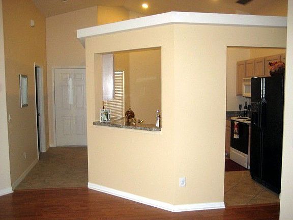 Master bedroom is by the front & the foyer leads to the family room or kitchen