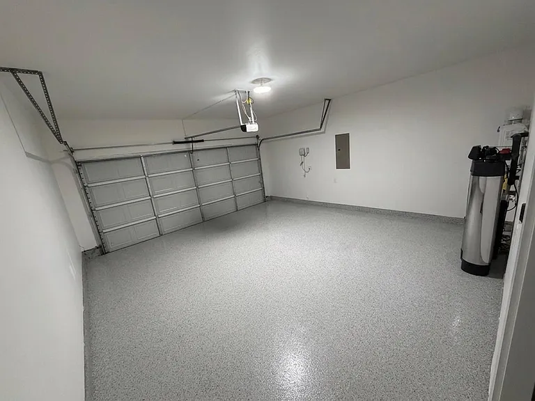 Fully Painted Garage with stunning Epoxy Coated Flooring!!