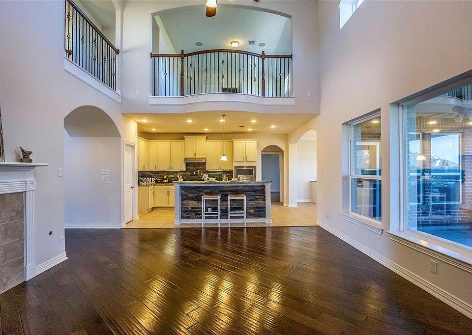This amazing open concept living area is the center of this gorgeous home that boasts too many upgrades to list!!