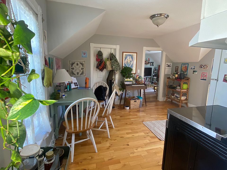 From the galley kitchen, looking through the kitchen/dining room towards the living room.