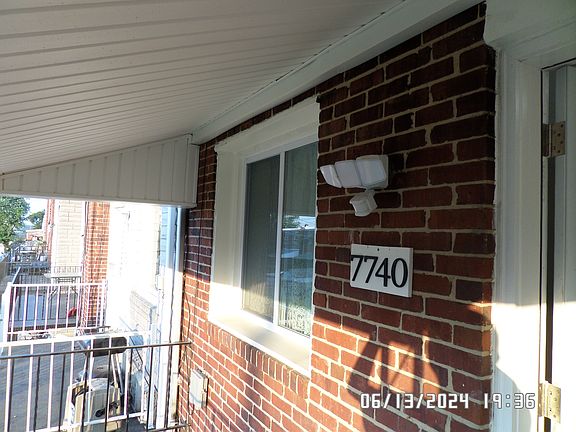 FRONT PORCH COVER WITH AUTOMATIC SECURITY LIGHT