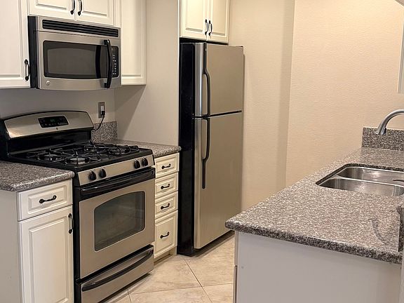 2nd image of 6600 Warner Ave Unit 117