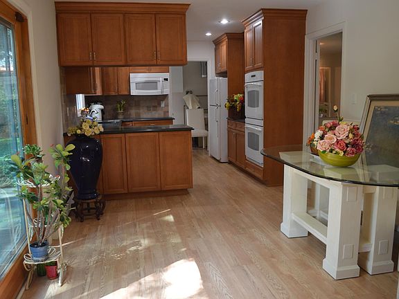 Kitchen with Anderson oversize glass door to go to backyard