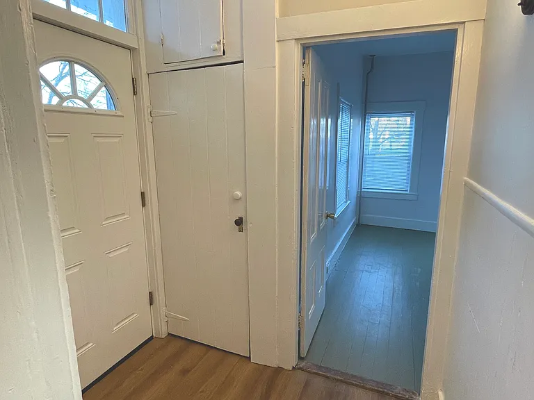 Driveway-side entrance with private mudroom and coat closet. Bonus room/office