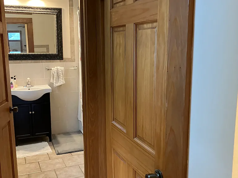Storage closet outside bathroom