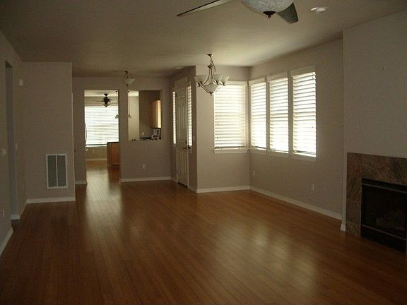 Clean as a whistle, all bamboo flooring, large TV Niche and gas fireplace. Dining and living room co