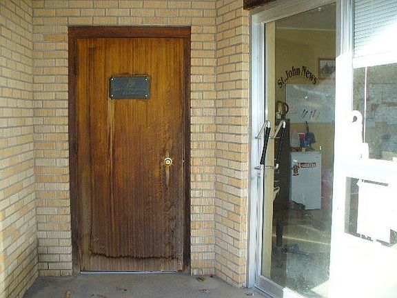 View of separate entrances for the building and rented office space 