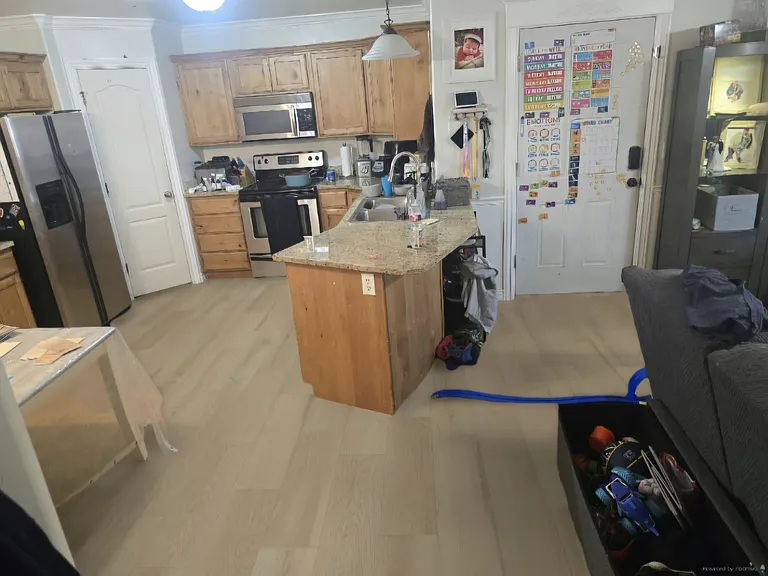 Another view of the kitchen from the living room/hallway.
