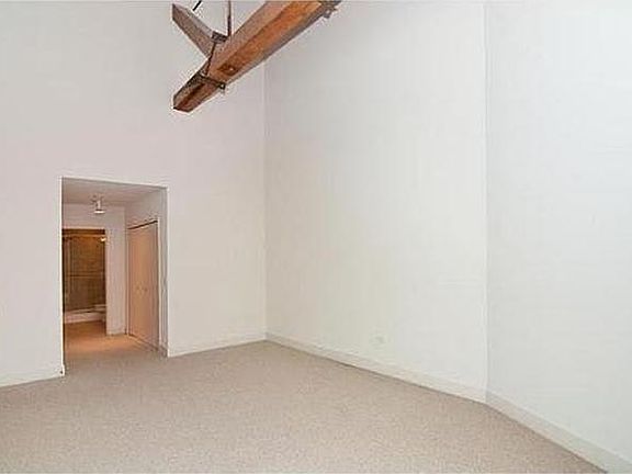 Lofted Master Bedroom with full bath and walk-in closets