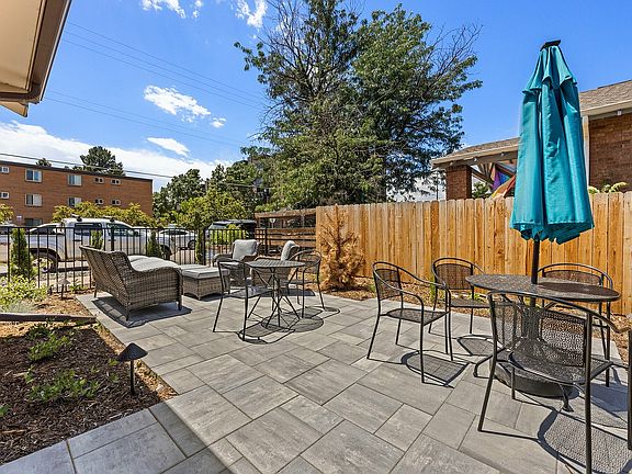 Relax and unwind in this cozy outdoor patio, perfect for entertaining guests.