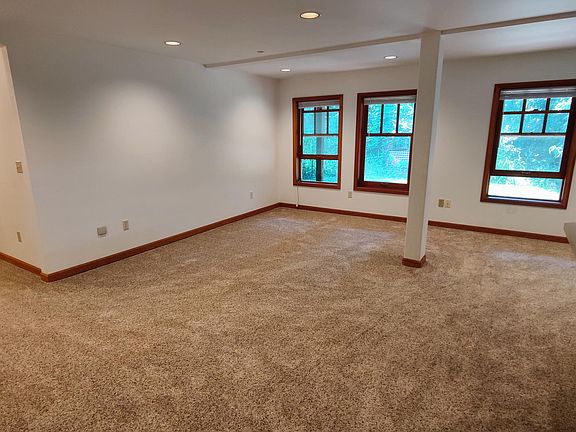 Enter the apartment into a roomy main living room/dining room area and open plan kitchen.