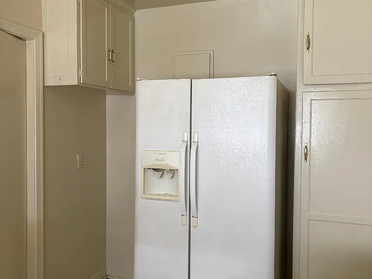 Plenty of cabinet space built-in pantry comes with refrigerator and stove