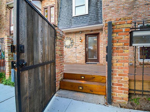 Entrance to your gated courtyard deck. Note the new sidewalk installed by the city during the recent resurfacing of the street.