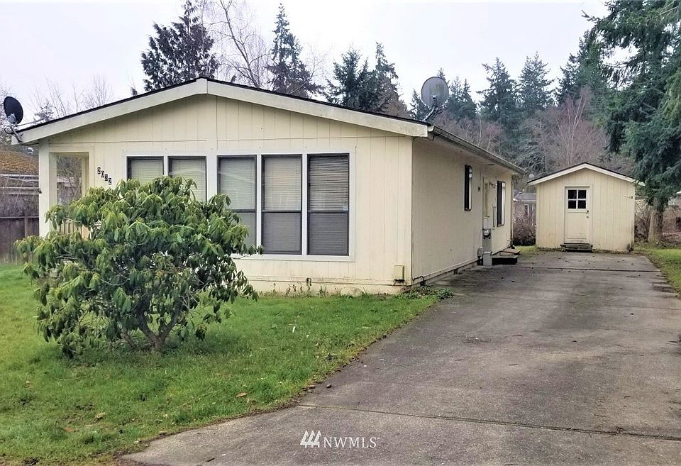 Starter home with open floor plan 2 bedrooms, 2 full baths and has a storage shed