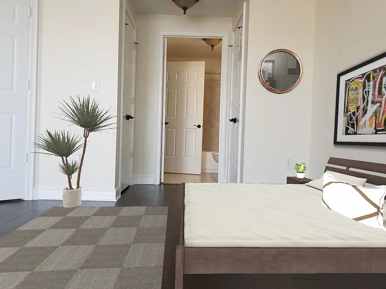 Fabulous light in master bedroom. (Virtually staged)