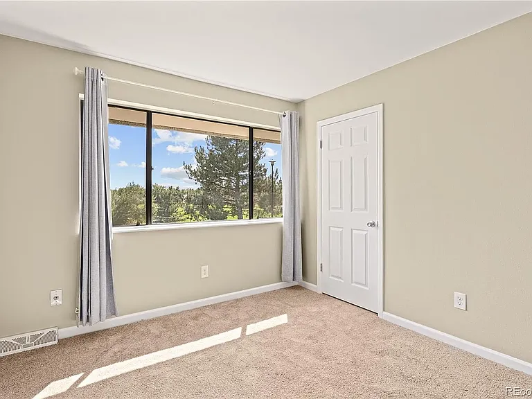 Upstairs bedroom with walk-in closet.