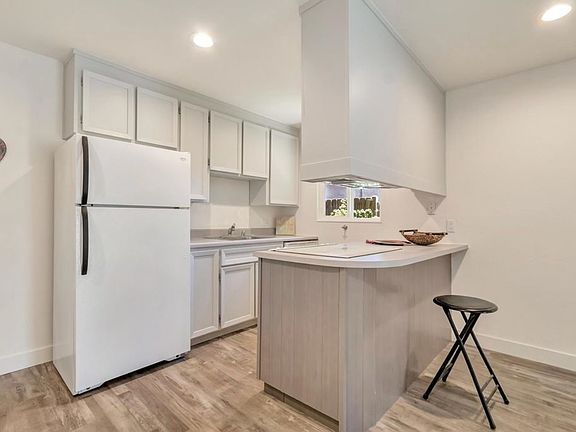 Kitchen. Fridge is not full size.