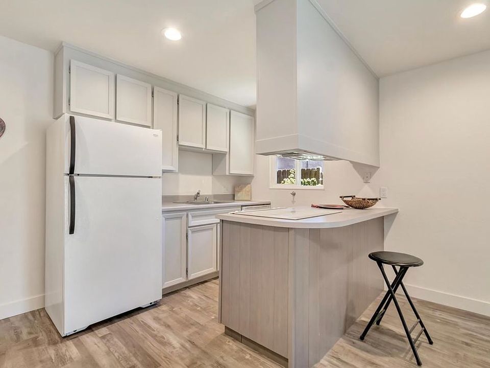 Kitchen. Fridge is not full size.