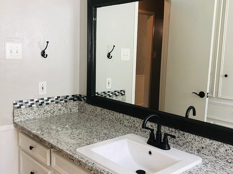 Beautiful guest bath. Shower and tub. Granite____