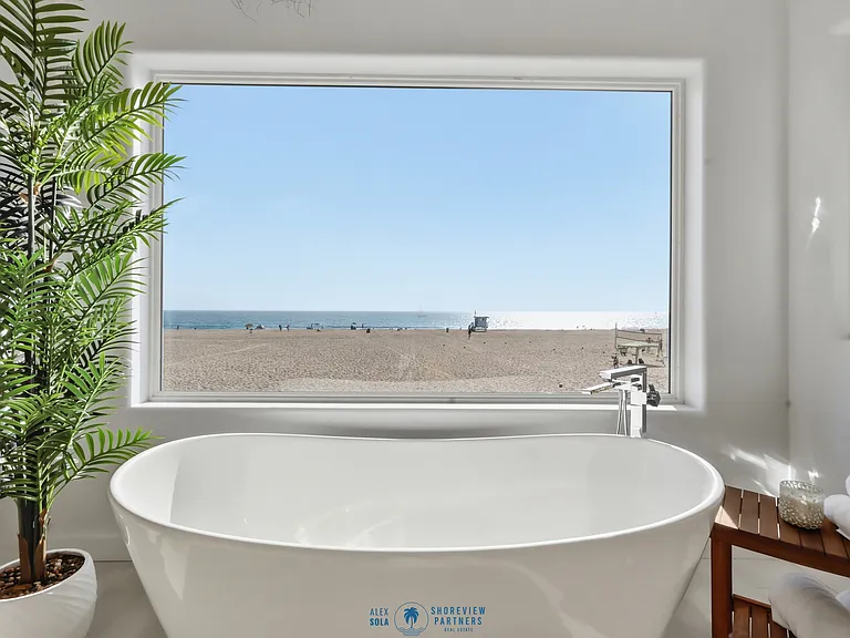 Primary bedroom features a covered balcony, fireplace, large spa bathroom, and incredibly spacious walk-in closet.