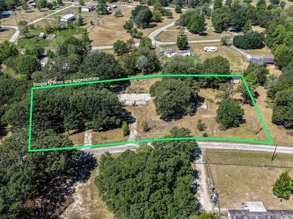 15 Creek Point, Huntsville, TX 77320