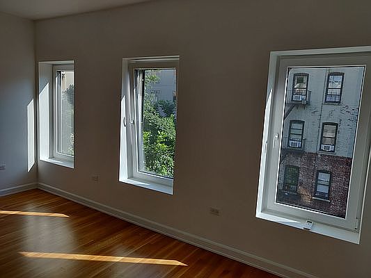 5th image of 22 E 129th St APT 3