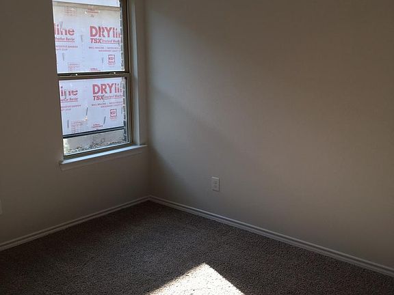 Good-sized third bedroom with double-door closet