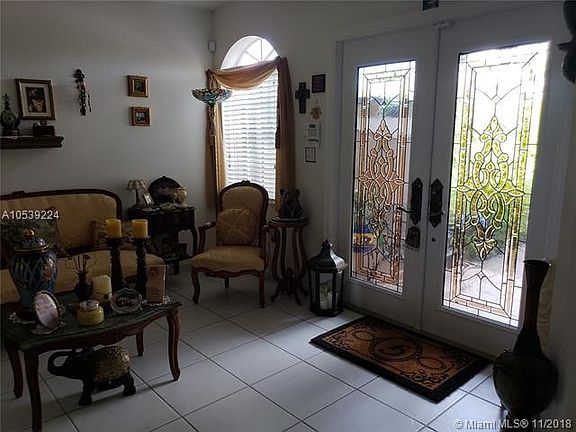 Beautiful Impact Glass front door