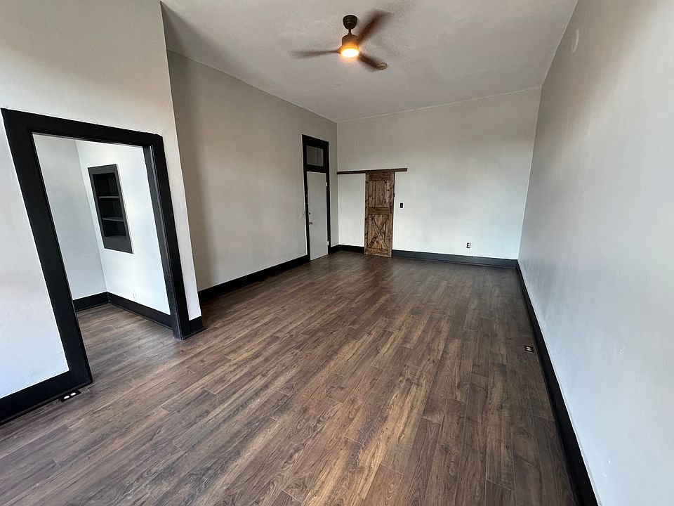 Your very spacious living area. Complete with brand new hardwood flooring.