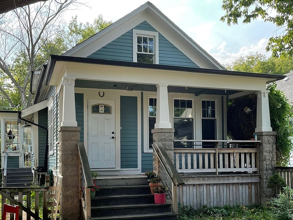 Inside fence, front of house