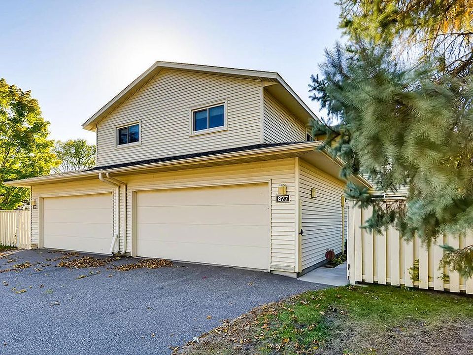 Exterior offer 2 car garage and private patio