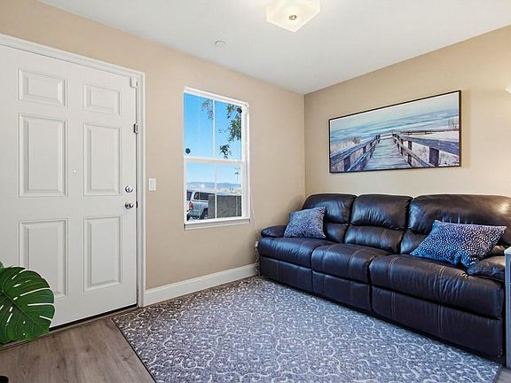 downstairs bonus room with bathroom, use as office or extra family room or workout area