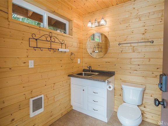 Bath house interior. Electric Wall heat. Cute t&g walls.