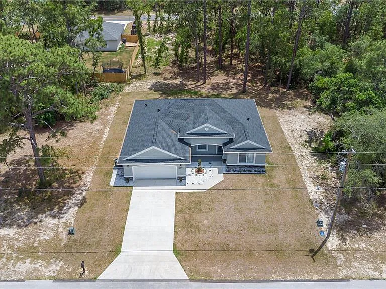 696 Marion Oaks Trl — Photo 26