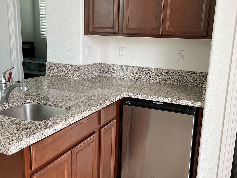 Kitchen / Wet bar with small fridge and freezer. Microwave and single burner electric induction stove is provided upon request.