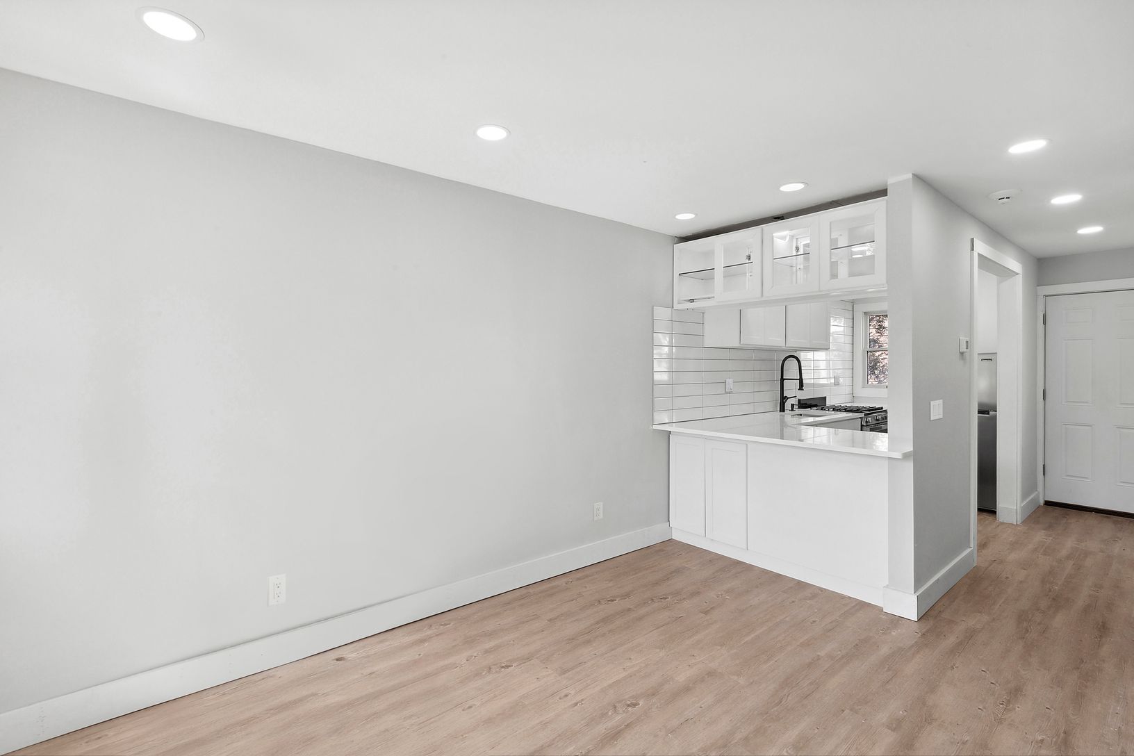 Living area looking into kitchen