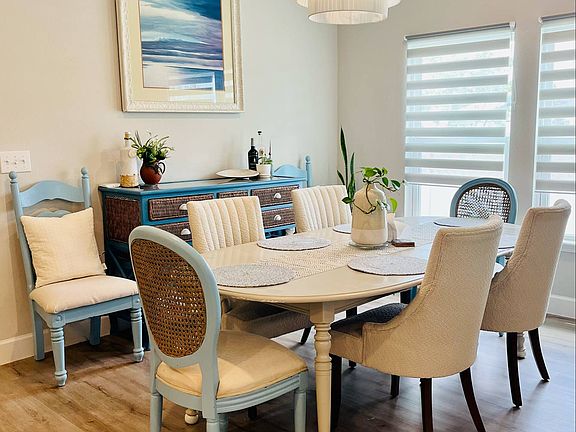 Bright dining room with seating for 6