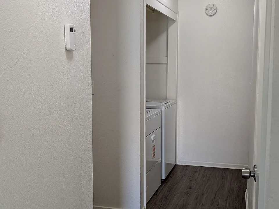 Separate Laundry Area on left. Hall Closet on right