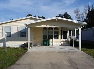 418 Kumquat Dr, Barefoot Bay, FL 32976
