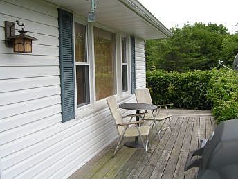 Back deck wraps around side of house