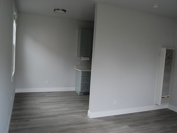 Dining area and entry into kitchen.