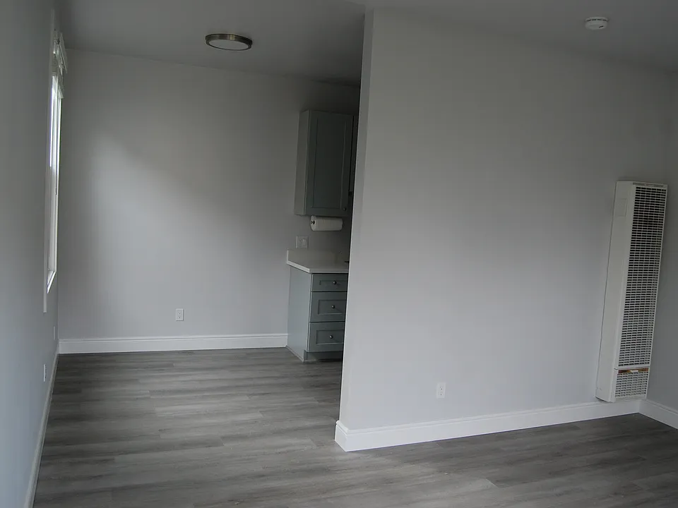 Dining area and entry into kitchen.